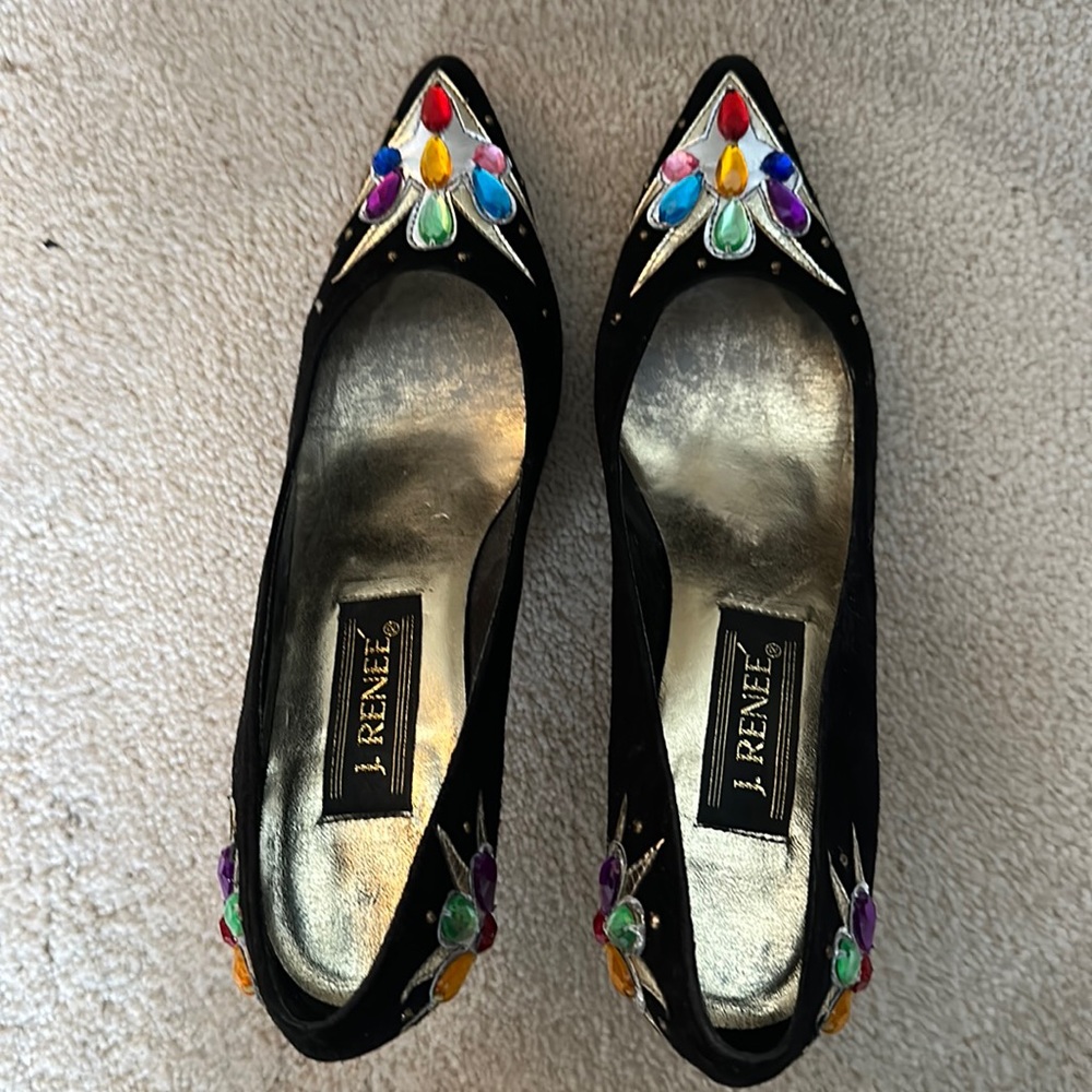 Black suede, jeweled dress pumps.